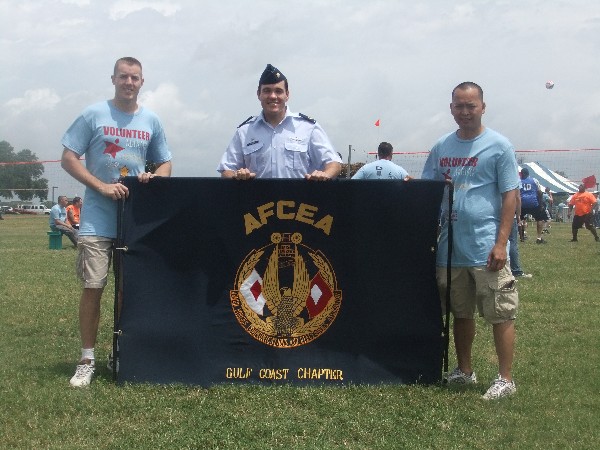 Volunteering at the Special Olympics Mississippi State Summer Games in May are (l-r) 2nd Lt. Christopher D. Arnold, USAF, chapter treasurer; Maj. Jeffrey J. Gomes, USAF, chapter president; and Capt. Arris C. Pineda, USAF. 